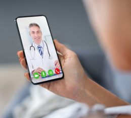 Online Counselling: Is It Right For Me? Woman Holding Mobile Phone, Receiving Online Counselling